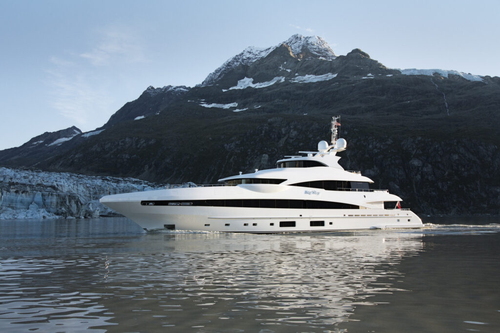Heesen yachts MySky side view at sea with mountains